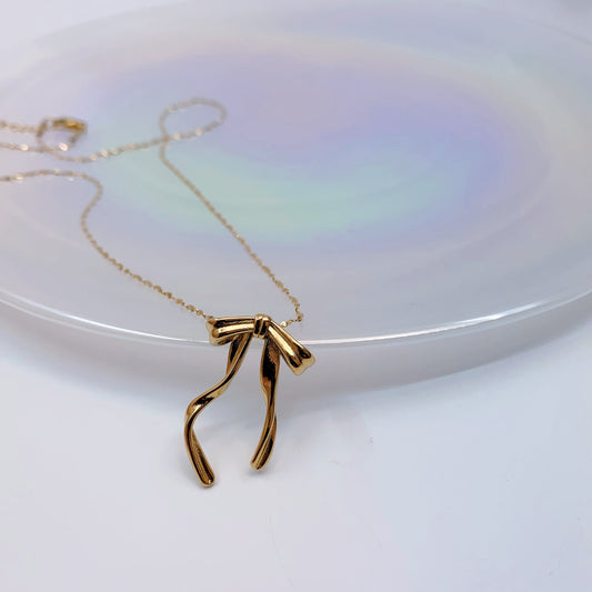 Twisted Bow Pendant Necklace
